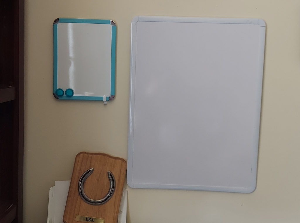 A pair of white boards